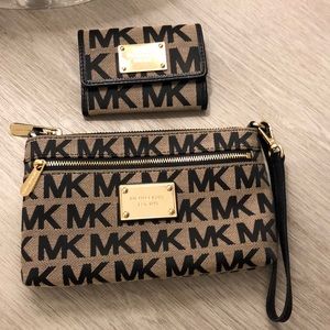 Michael Kors wristlet and marching wallet.